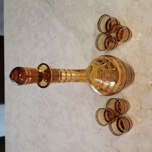 Vintage Amber with gold stripes decanter and glasses.